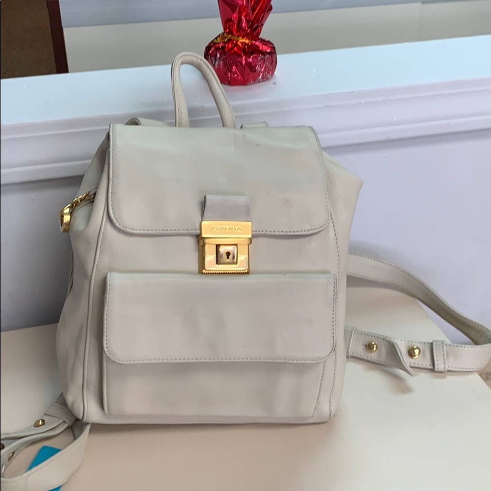 Perlina cream leather backpack w double strap